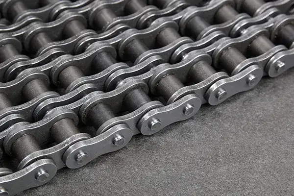 Industrial driving roller chain. Part of the chain drive of machine-building mechanism.